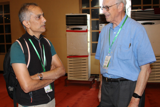 Prof. Micheal interacting with one of the participants