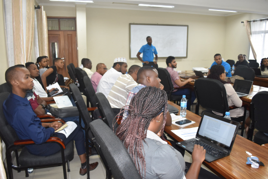A section of EfDT academic seminar participants following presentation by the Dr. Chegere