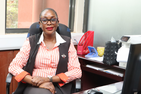 Maureen Anino  speaking from her office 