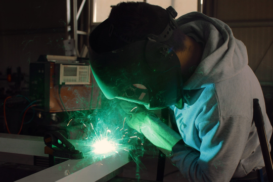 Welder in factory