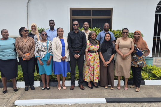 Section of participants in a group photo
