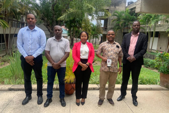 Tanzania IGE fellows pose with the senior researches 