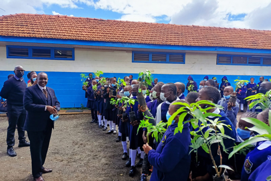 Prof. Richard Mulwa (Center Director), EfD Researchers, representatives from the Ministry of Agriculture, Livestock, Fisheries and Cooperatives, and St. George’s students participate in tree planting. 