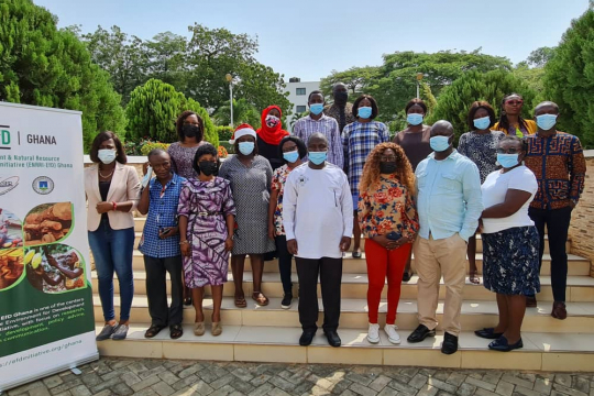 Wisdom Akpalu joins some participants at the science communication workshop for a photo