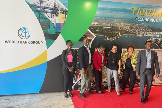 Julieth Tibanywana (from left) with other WASH stakeholders