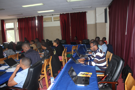 A section of bootcamp participants practicing Python modeling   Photo by Salvatory 