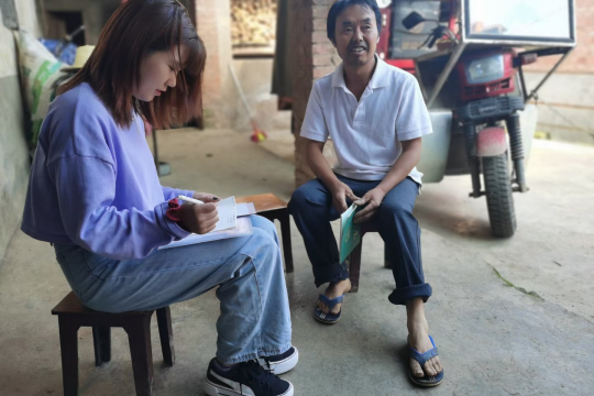 A Yunnan farmer completing the survey