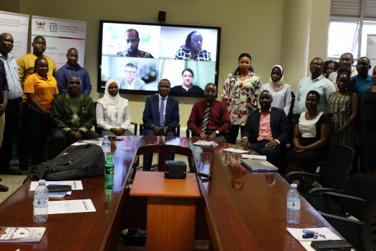 Participants posing with the online audience after the launch