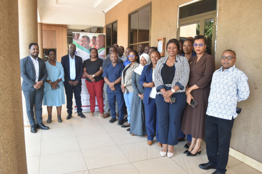 Participants pose for a group photo during the IGE Stakeholders’ Workshop. Photo by Salvatory Macha