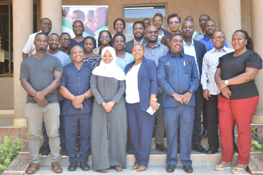 Participants pose for a group photo during the IGE Stakeholders’ Workshop. Photo by Salvatory Macha