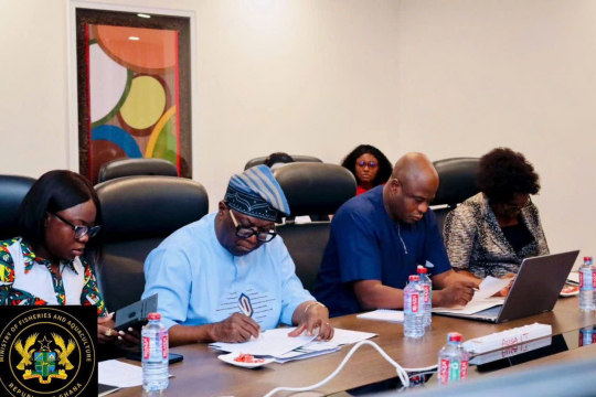 Participants taking notes