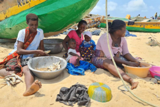 Many families in Ghana, like these women, depend on the fisheries sector for sustenance.