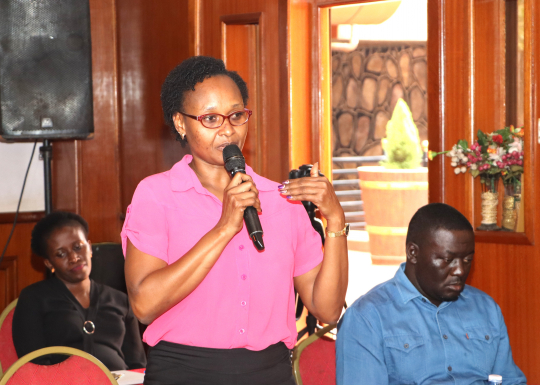 A local government official clarifies on some issues during the discussion