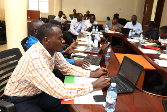A section of participants conducting an exercise on use of AI in perfecting their work