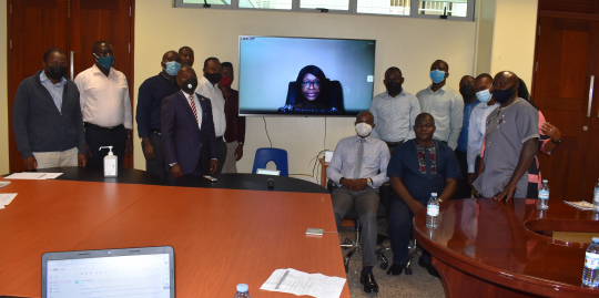 EfD-Mak Centre Director Prof. Edward Bbaale and research fellows posing for a group photo with the facilitator Dr. Byela Tibesigwa online: Photo: EfD-Mak centre