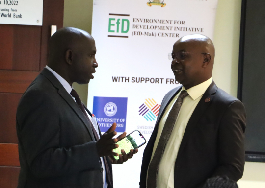 Dean School of Agricultural Sciences Prof. JB Tumuhairwe interacts with Prof Edward Bbaale