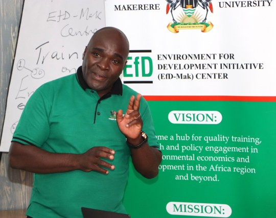 Dr. John Sseruyange presenting