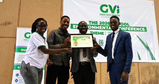 Dr. Peter Babyenda (3rd) flanked by EfD Members receives certificate after presentation:Photo by EfD-Mak 