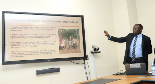 Peter Babyenda presenting the study tour findings at ministry's headquarters in Luzira