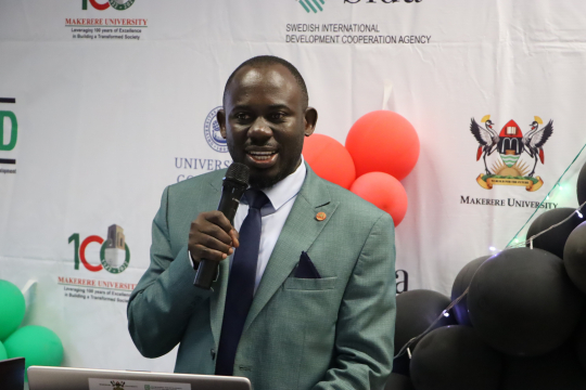 Policy engagement specialist Dr. Peter Babyenda speaking during the party