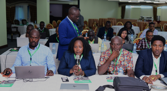 A participant reacts to the Alumni presentation: Photo by Jane Anyango