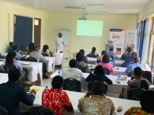Facilitator addresses participants at the proposal and academic writing workshop 