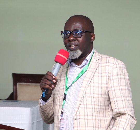 Nathan  Mununuzi speaking on how IGE program has contributed to policy and practice: Photo by Jane Anyango