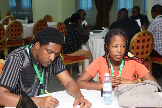 Habtamu Alamayo and  other IGE fellows during group discussions: Photo by Jane Anyango