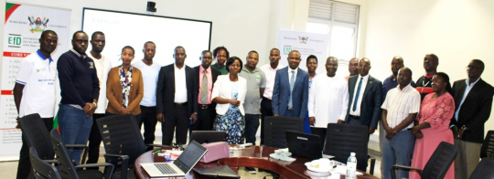 The seventeen government fisheries officials with Edward Bbaale and Wisdom Akpalu after completing the two-day training on 16th March 2023 at the EfD-Mak Centre, Yusuf Lule Central Teaching Facility, Makerere University.