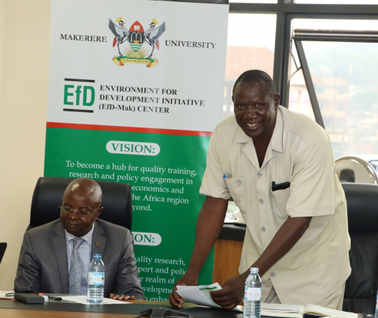 Mr. Stephen Mugabi (R) chaired the meeting and officially opened the workshop