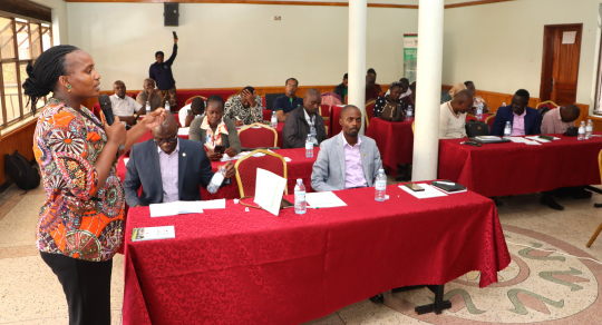 Tusiime Florence the Fortportal District speaker closing the policy dialogue