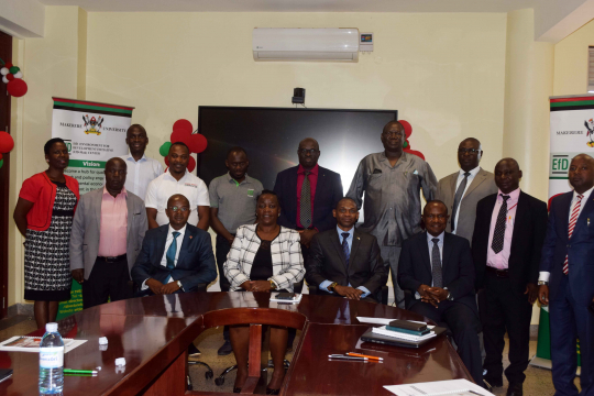 Participants pose for a group photo after inauguration of the board