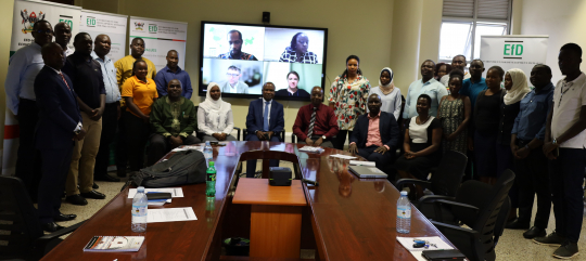 Online and physical participants posing for a group photo after the launch