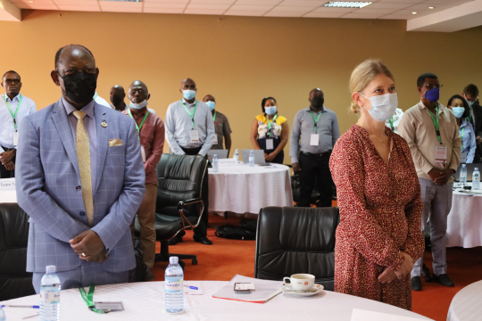 Prof. Barnabas Nawangwe Vice Chancellor Makerere University and Ambassodor Maria stand with other partcipants singing the national anthems