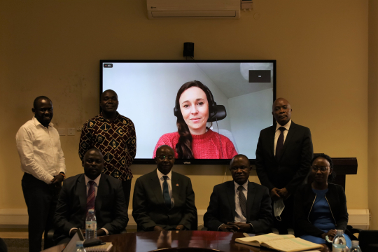 Some of the new IGE Fellows cohort 2022 posing for a group photo with Prof. Edward Bbaale and Dr. Eria Hisali (2nd and 3rd) with the Co programme leader online