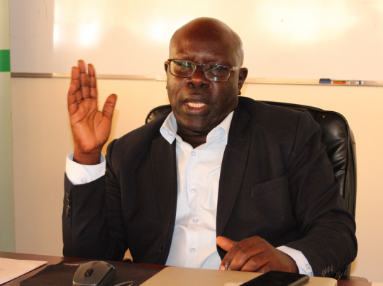 The Ag. Vice Chancellor Muni University Prof. Robert Kajobe  addressing participants during the opening session 