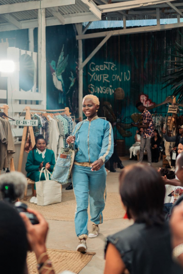 Showcasing the Afrowema fashion collection on the runway:  