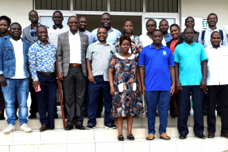 Section of participants of the training on CBA pause for a group photo