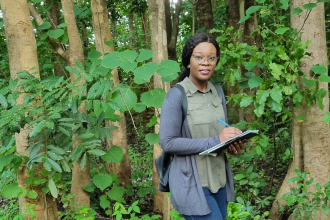 Chizoba during a field trip in Malawi forest