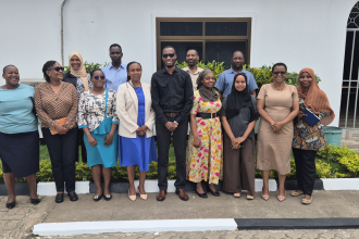 Section of participants in a group photo