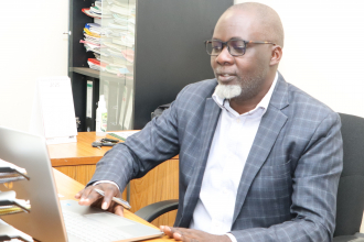 Nathan Mununuzi at his office