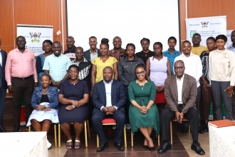 Participants in a group photo after the opening session