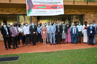 Participants posing for a group photo after the opening ceremony at the Speke Hotel Munyonyo Kampal Uganda