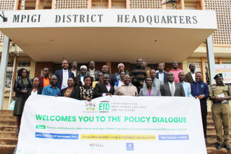 Participants posing for a group photo after the policy dialogue.