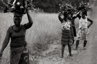 Women carrying firewod